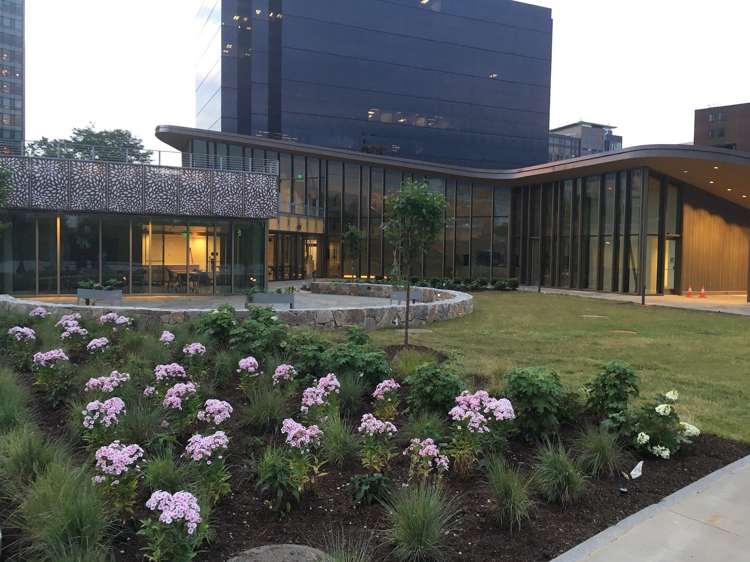 Local flowers grow outside of the recently opened Whittingham Discovery Center at Mill River Park in Stamford