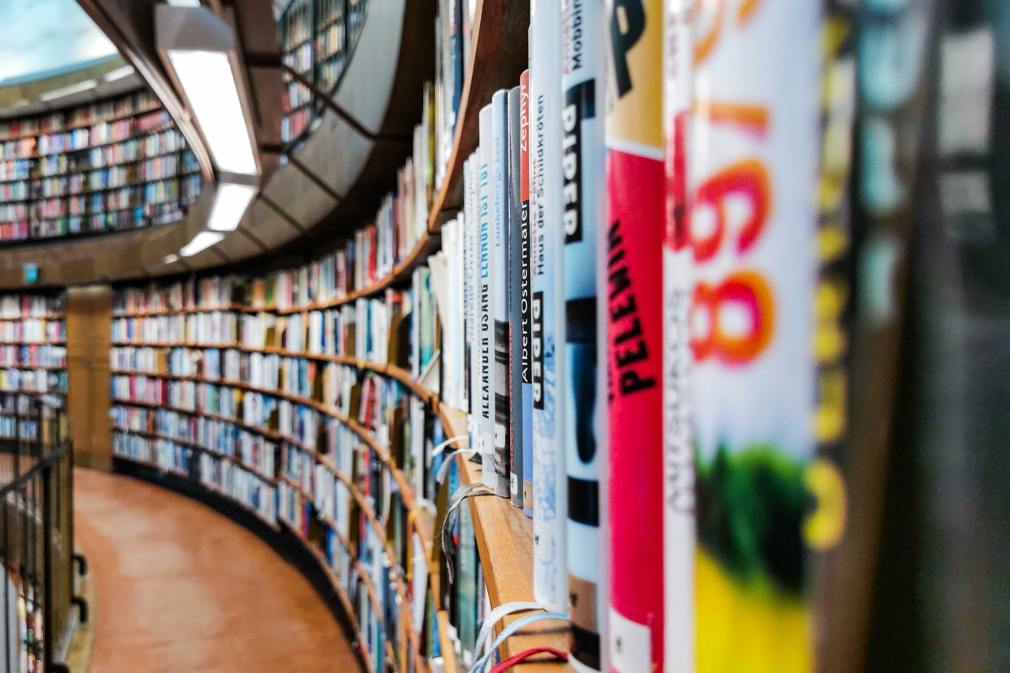 colorful books on public library shelves